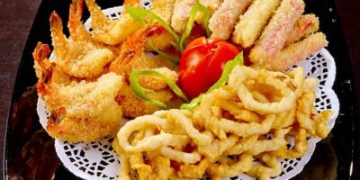 身障人士問可否加設殘障坡道 新莊友善餐廳佛心老闆不僅入口設坡道 店內還讓身障者展出創作